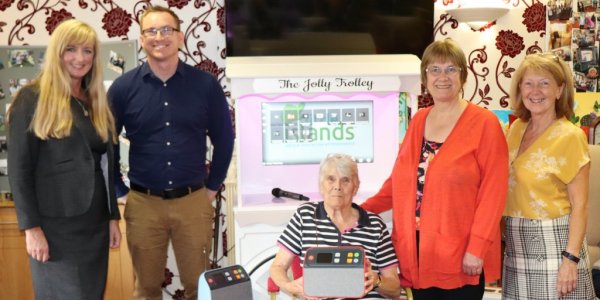 Residents and guests with Jolly Trolley